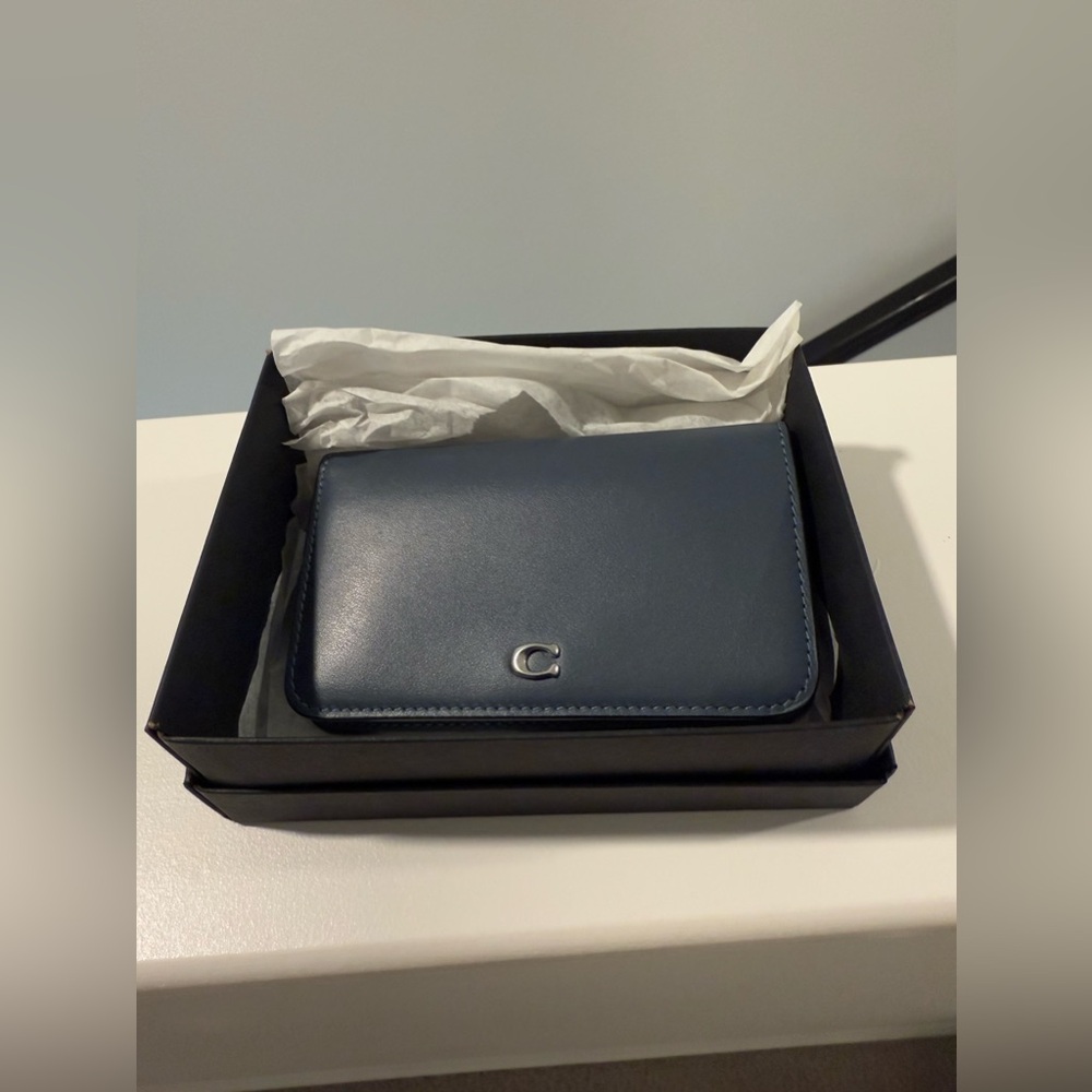 Brand new navy blue Coach wallet